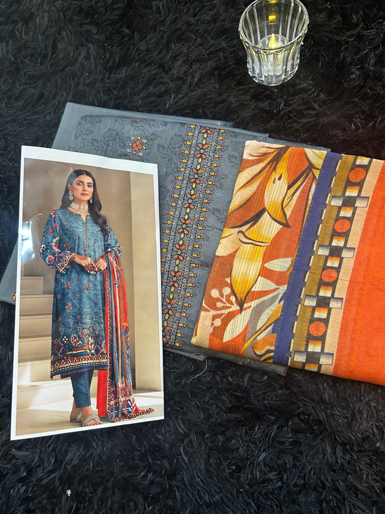 Slate Blue 3-Piece Unstitched Collection – Floral Embroidered Shirt, Sunset Orange Printed Dupatta, and Dyed Trousers